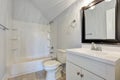 White interior of vintage bathroom with vaulted ceiling Royalty Free Stock Photo