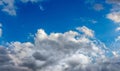 White irregular shape clouds on blue sky background_