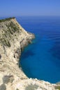 White island cliff in bright blue water Royalty Free Stock Photo