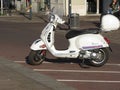 White Italian Vespa scooter in Vienna Royalty Free Stock Photo