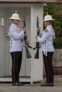 White-jacketed Grand Palace soldiers by sentry box Royalty Free Stock Photo