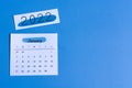 White January 2022 calendar on blue background. New Year 2020 Concept