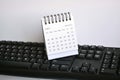 White January 2021 calendar on a keyboard with white backgrounds. New Year Concept Royalty Free Stock Photo