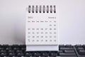 White January 2021 calendar on a keyboard with white backgrounds. Royalty Free Stock Photo