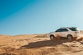 Dune bashing on summer, blur movement of sand