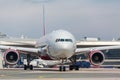 White jet airplane on the runway Royalty Free Stock Photo