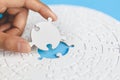 White jigsaw in the hands of humans, The correct solution. Teamwork, Solving and completing the task. Last piece of jigsaw puzzle Royalty Free Stock Photo