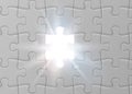 White jigsaw puzzle with missed and shining piece. Solution concept. Royalty Free Stock Photo