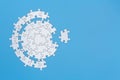 White jigsaw puzzle pieces on a blue background. Problem solving concepts. Texture photo with copy space for text Royalty Free Stock Photo