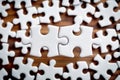 White jigsaw puzzle pieces connecting teamwork concept solution problem solving strategy success 100 piece puzzle Royalty Free Stock Photo