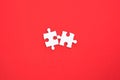White jigsaw puzzle on red background Royalty Free Stock Photo