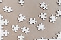 White jigsaw puzzles, on cardboard Royalty Free Stock Photo