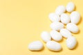 White jordan almonds on yellow background Royalty Free Stock Photo