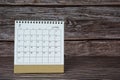 White July 2022 calendar on wooden desk. 2022 new year concept.