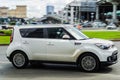 White KIA Soul car moving fast on the street Royalty Free Stock Photo