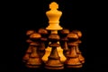 White King beset by black pawns Royalty Free Stock Photo