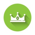 White King crown icon isolated with long shadow. Green circle button. Vector Royalty Free Stock Photo