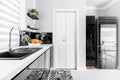 White kitchen with additions Royalty Free Stock Photo