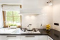 White kitchen with black countertop