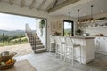 White kitchen with chairs and panoramic view Royalty Free Stock Photo