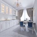 White kitchen with dining table in a classic style. The bright interior of the kitchen Royalty Free Stock Photo