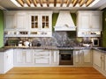 White kitchen furniture in the interior of the kitchen in the Arabian style with green walls and wooden ceiling backlighting Royalty Free Stock Photo