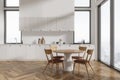 White kitchen interior with round dining table Royalty Free Stock Photo