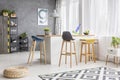 White kitchen island and barstools