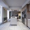 White kitchen island in a modern kitchen with a large glass sideboard with crockery with kitchen furniture in brown