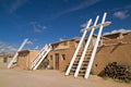 White Kiva Ladders in Pueblo Royalty Free Stock Photo