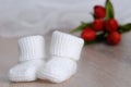 White knitted baby booties Royalty Free Stock Photo