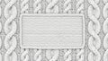 White knitted fabric background with a rectangular frame for text Royalty Free Stock Photo