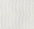 White Knitted Fabric Texture.White knitted carpet closeup.