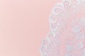 White Lace Fabric on Soft Pink Background. Copy space Royalty Free Stock Photo