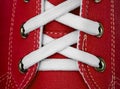 White lace on red sneakers Royalty Free Stock Photo