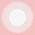 White lace serviette on a pink background. Openwork vintage round frame