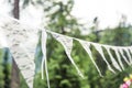 White Lace Wedding Banner Floating in the Wind Outside