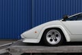 White Lamborghini Countach front with blue background