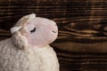 White lamd on wooden background Royalty Free Stock Photo