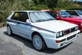 White Lancia Delta Rally Car