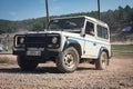 White Land Rover Defender in the field in Barcelona, Spain