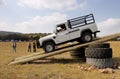 White Land Rover Defender 110 HC on 4x4 Course