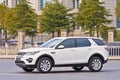 White Land Rover Discovery on the road in Yiwu, China