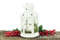 White lantern with candle inside and Christmas decoration. Copy space Royalty Free Stock Photo