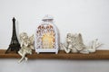 White lantern and Fairy statue Home decoration accessories on wooden shelves