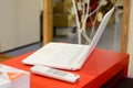 A laptop in the reading room of the public library. Royalty Free Stock Photo