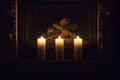 White large candles standing on the fireplace. Royalty Free Stock Photo