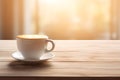 White latte coffee mug on Wooden plank floor table, side view, fresh atmosphere, sunlight in the early morning background