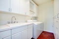 White laundry room with a red floor Royalty Free Stock Photo