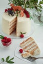 White, layered, multi-layer cake from biscuit smeared with cream